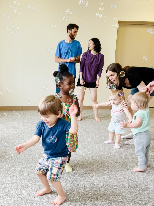 Dance party with babies, toddlers, preschoolers, parents, and bubbles