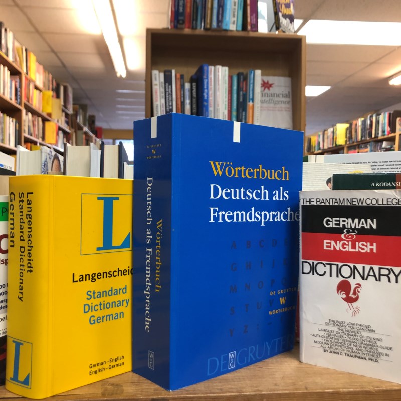 German-English disctionaries on a bookshelf at Pegasus Book Exchange in West Seattle