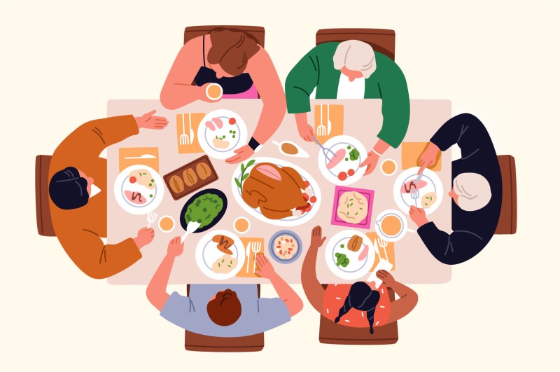 Bird's eye view illustration of a multigenerational family gathered around a dining table sharing a meal together.